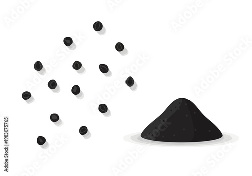 Black granules pouring onto a heap on a clean surface