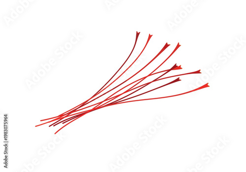 A bundle of red cable ties lies on a white surface.