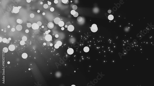 Bokeh lights and small star-like sparkles background animation