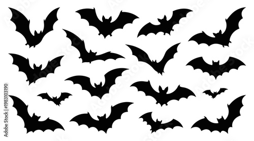 Black bats flying in formation.