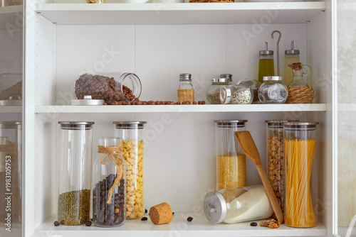 Canvas Print Cluttered kitchen shelves, a cabinet with kitchen utensils for storing utensils,