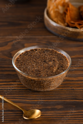 Plant based chia caviar with gluten free crepes. Healthy vegan dairy free breakfast. Vertical orientation.