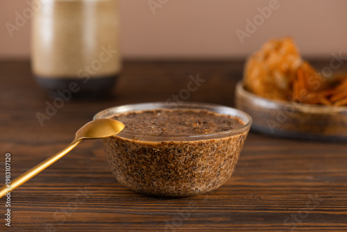 Vegan caviar from chia seeds and nori with gluten free pancakes, sugar free, clean eating on a wooden table.