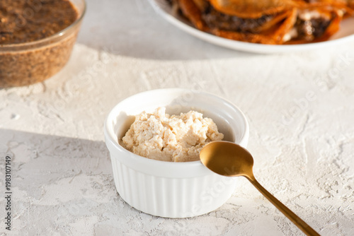 Vegan ricotta cashew cheese with gluten, dairy and sugar free crepes and caviar from chia seeds. Healthy Breakfast