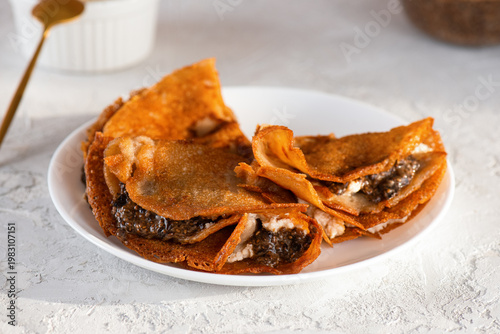 Gluten free crepes with vegan chia caviar, dairy free, sugar free. Healthy plant based breakfast.