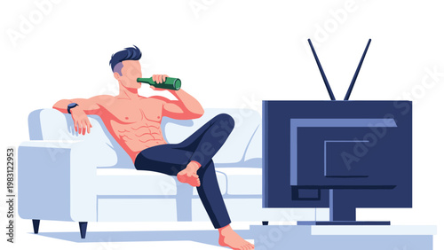 Relaxed man sits on a white sofa without a shirt while drinking beer and watching his favorite television program.