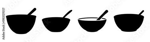 set of four black kitchen mixing bowls with spoons isolated on white background
