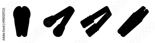 Set of four black kitchen tongs isolated on white background