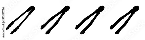 Set of four black kitchen tongs isolated on white background