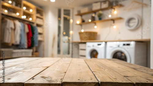 Minimal wooden table surface with soft blurred laundry room background interior home concept