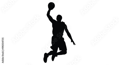 Silhouette of a basketball player in mid air preparing to shoot or dunk