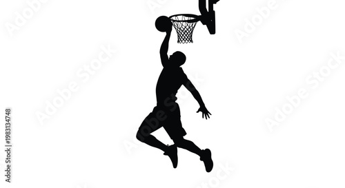 Silhouette of a basketball player in mid air preparing to dunk the ball