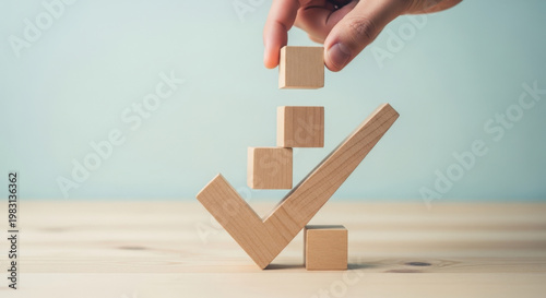 Wooden Blocks Making Checkmark Sign on Wooden Table. Symbol Success. Concept Checkmark Sign Success Goal Achievement Plan Complete. Business Concept
