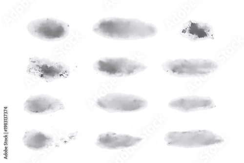 A delicate collection of soft grey watercolor washes and faded ink blots on a white background. These subtle, textured strokes feature misty edges and a translucent feel, making them ideal for minimal
