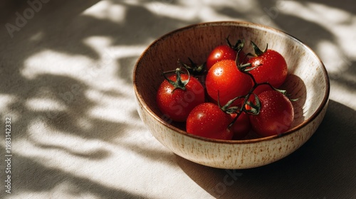 Fresh Cherry Tomatoes in a Bowl with Natural Light and Shadow Play