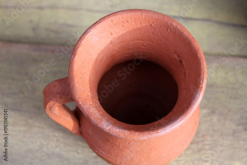 Obraz na plátne earthenware cup on the table