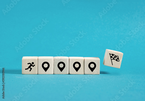 Runner reaching final goal on wooden blocks