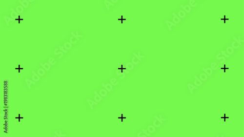 Chroma key background with cross markers for VFX tracking, ideal for professional video compositing, film production, and visual effects workflows.