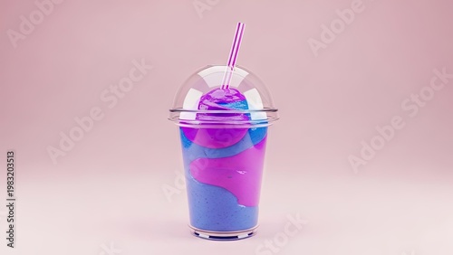 Colorful smoothie drink in a clear cup with straw against pink background