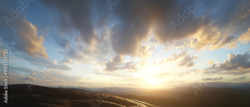 a beautiful sky with clouds at sunset, view from the top of a hill overlooking mountains