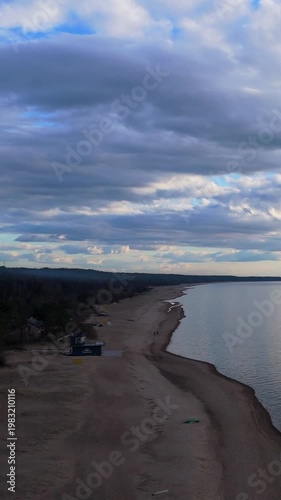 Peaceful Evening At Saulkrasti Beach Before Sunset With Calm Baltic Sea, Soft Pastel Sky, Gentle Waves, And Tranquil Spring Atmosphere Creating Relaxing Coastal Landscape Footage