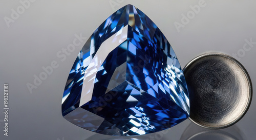 Close-up of a Faceted Gemstone on a Reflective Surface