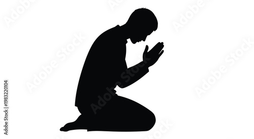 Silhouette of a man kneeling in prayer against a white background