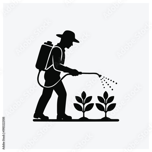Farmer spraying plants with pesticide or fertilizer silhouette