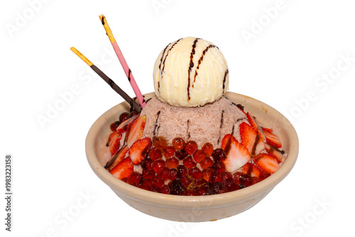 A decadent chocolate shaved ice bowl topped with vanilla ice cream, fresh strawberry slices, boba pearls, and chocolate-dipped biscuit sticks