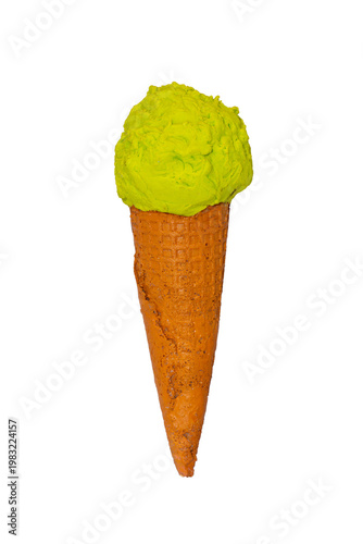 A single scoop of bright lime-green ice cream sits atop a textured, orange-brown waffle cone against a plain white background.