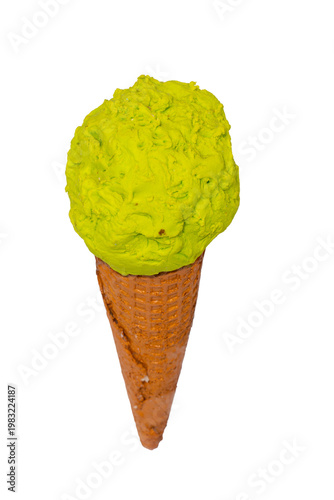 A single scoop of bright lime-green ice cream sits atop a textured, orange-brown waffle cone against a plain white background.