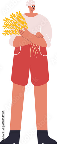 Farmer in turban holding bundle of wheat stalks, representing agriculture and harvest