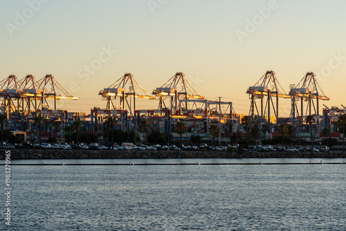 View of Port of Los Angeles and Container Terminal after sunset. The Port of Los Angeles is a seaport managed by the Los Angeles Harbor Department.