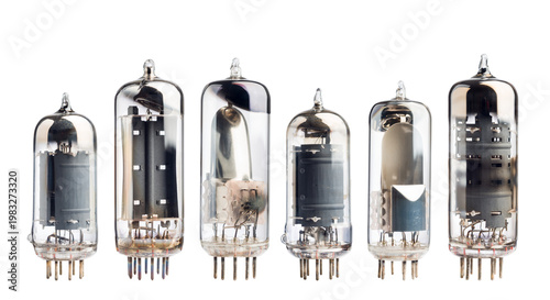 Variety of vintage vacuum tubes isolated on white background.
