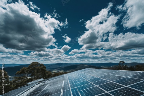 Rooftop solar panels on a hill under a dramatic sky, energy