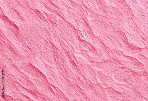 Close-up of textured pink material with deep creases and subtle shadow variations