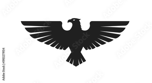 Black eagle silhouette flying high.