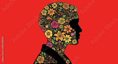 Silhouette of a persons head filled with flowers.