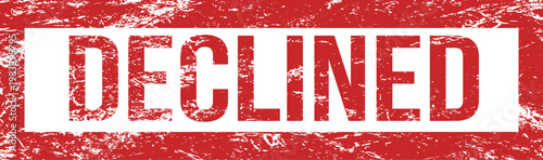 A weathered red rubber stamp with the word 'DECLINED' stands out in white lettering on a plain background.