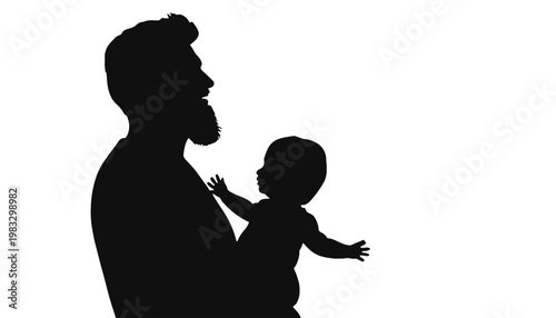Father holding baby in silhouette representing Father's Day  