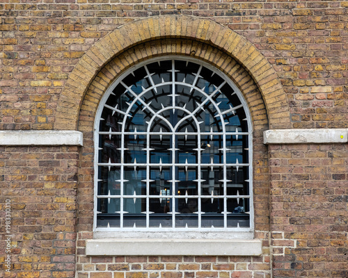 Old Docklands Warehouse Building on West India Quay in London, UK