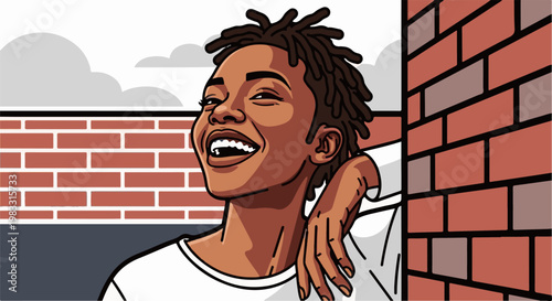Young person with dreadlocks laughing joyfully near a brick wall