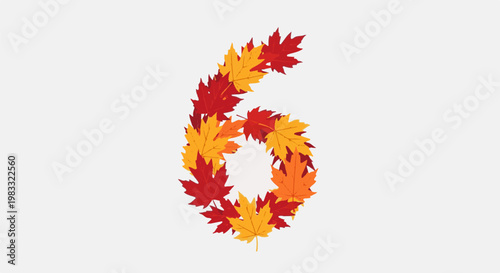 Number six formed by vibrant autumn maple leaves in red and gold