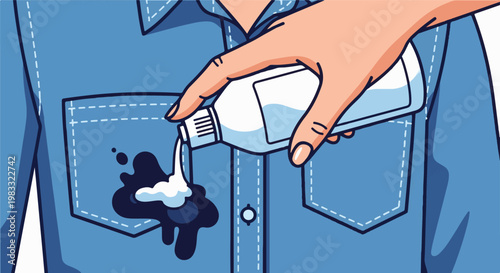 Hand pouring cleaning liquid onto a dark stain on blue fabric