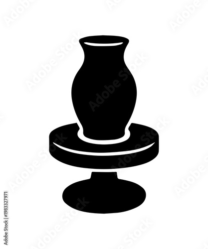 Black silhouette of ceramic pottery pot on a wheel