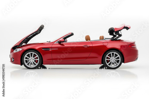Red Luxury Convertible Sports Car with Open Retractable Hardtop Roof on White Background, Side View