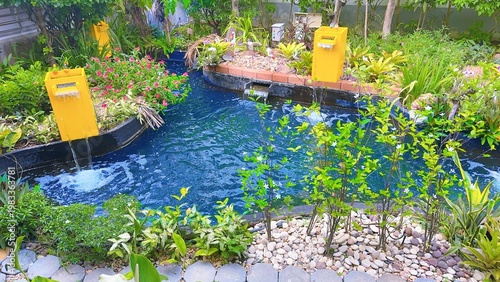Garden Water Feature Pond, Decorative Fountain and Landscaping Design, Lush Green Plants Water Feature Resort, fountain in the garden 