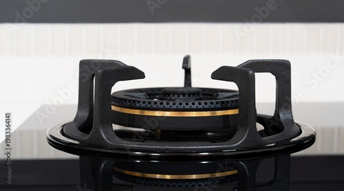 Obraz na plátně black gas stove burner, highlighting its design and functionality, suitable for
