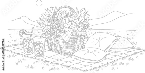 Wicker picnic basket filled with beautiful spring flowers sitting on a checkered blanket with cold glasses of refreshing lemonade drinks