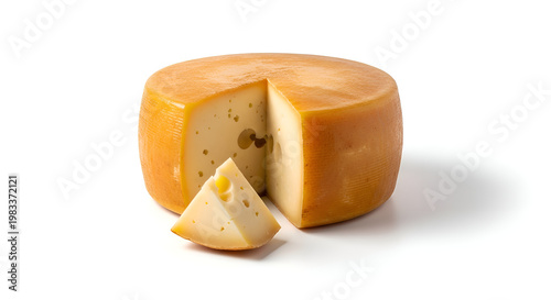 Delicious cheese wheel with slice.